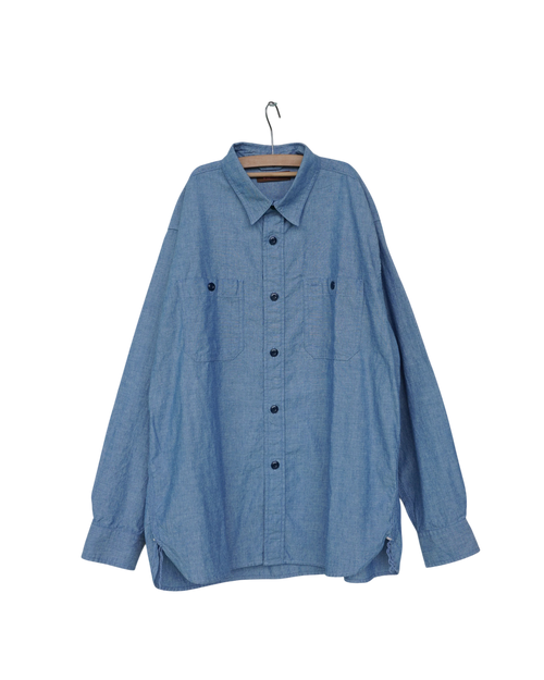 Chemise en chambray de coton bleu Merci Paris avec deux poches poitrine et coutures robustes