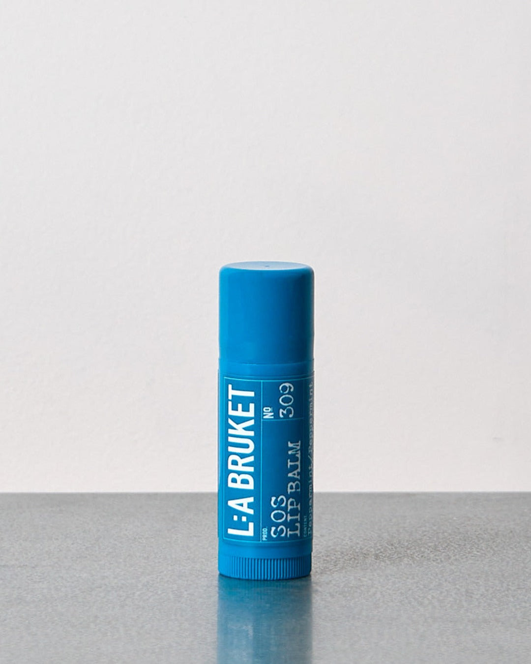 L:A Bruket - SOS Lip Balm