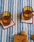 Merci - Set of 6 washed linen coasters - Primary Blue Paintbrush Stripes