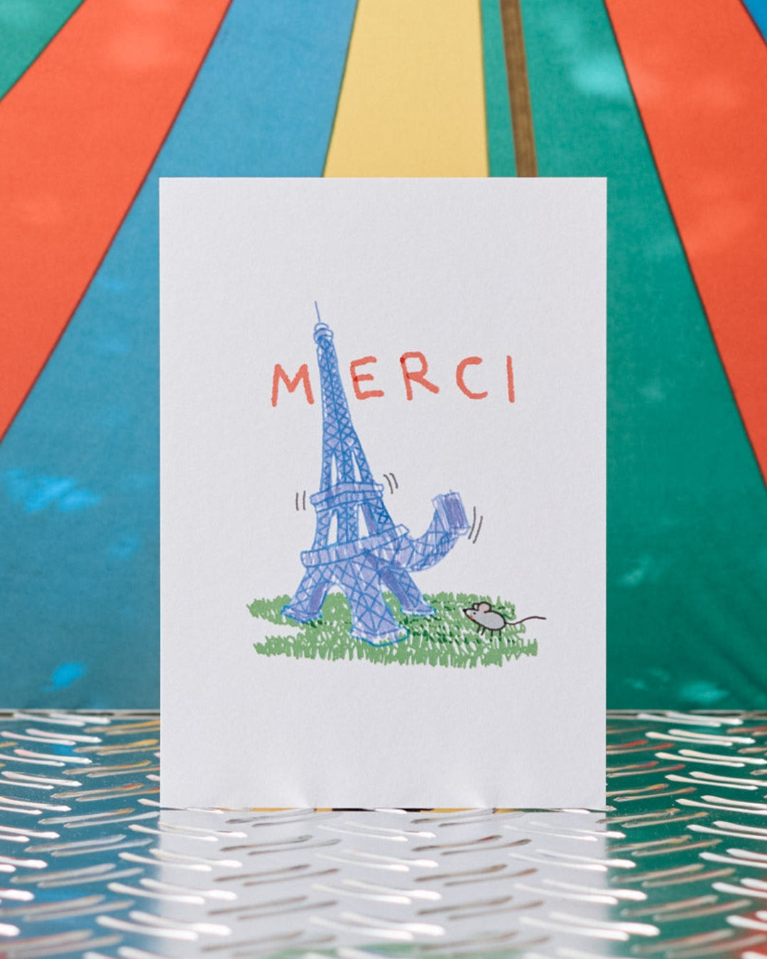 Merci x Shia Mcshia - Postcard featuring the Eiffel Tower and a mouse