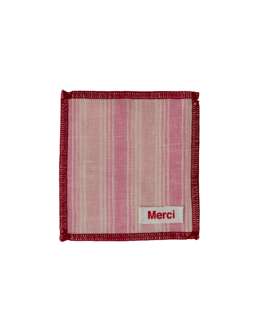 Dessous de verre Merci Paris en lin lavé rose à rayures avec bordure contrastée et étiquette de marque