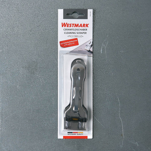 Racleur pour plaques en vitrocéramique