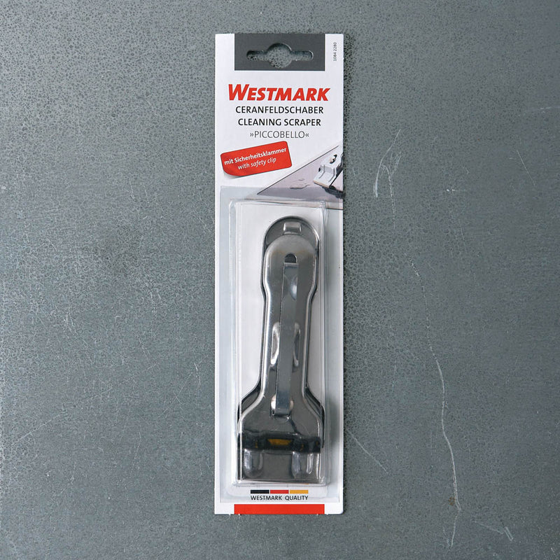 Racleur pour plaques en vitrocéramique