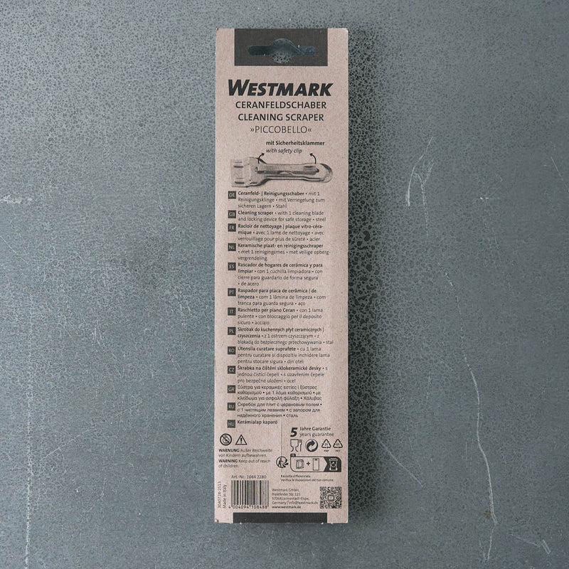 Racleur pour plaques en vitrocéramique