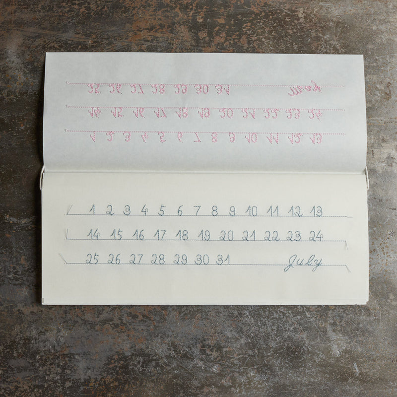 Calendrier mural à fil