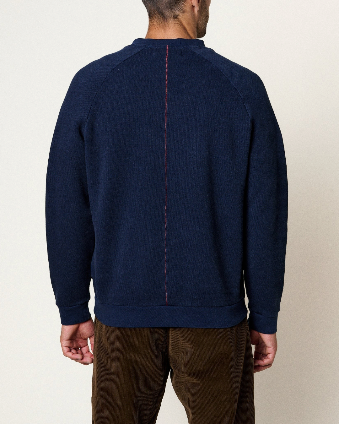 Sweat-shirt Merci Paris Homecore bleu Ocean avec manches raglan et couture rouge verticale au dos