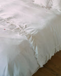 Merci - Drap plat en lin brodé - 01 Ruché