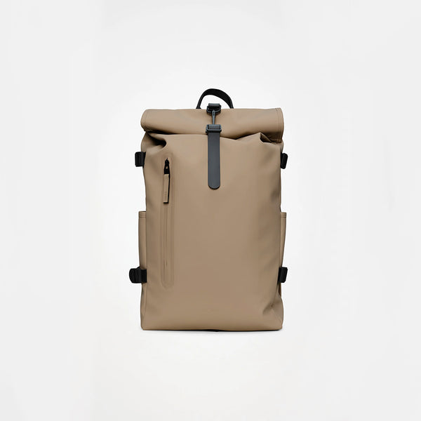 iconic rains bag Rolltop Rucksack - Waterproof Backpack with Chest Strap, Standard | roll-top with snap compression and carabiner closure, front zip pocket, side-access slip pocket and vented back Silhouette is characterized by its squared shape and flap with magnet snap fastenings Rains Backpacks | Macy's
