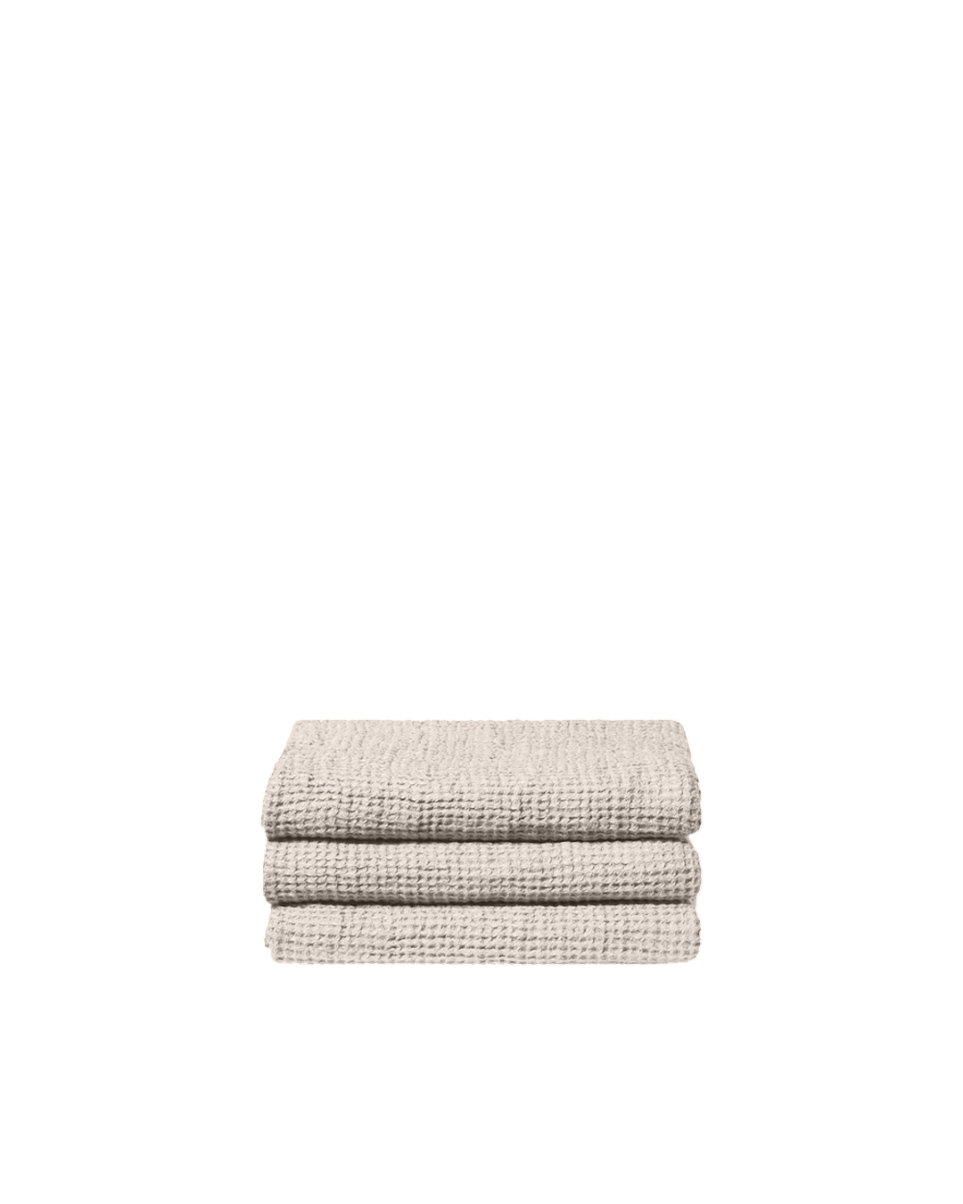 Serviette de bain Merci Paris en lin gaufré couleur pierre, texture douce et absorbante, pliée en pile