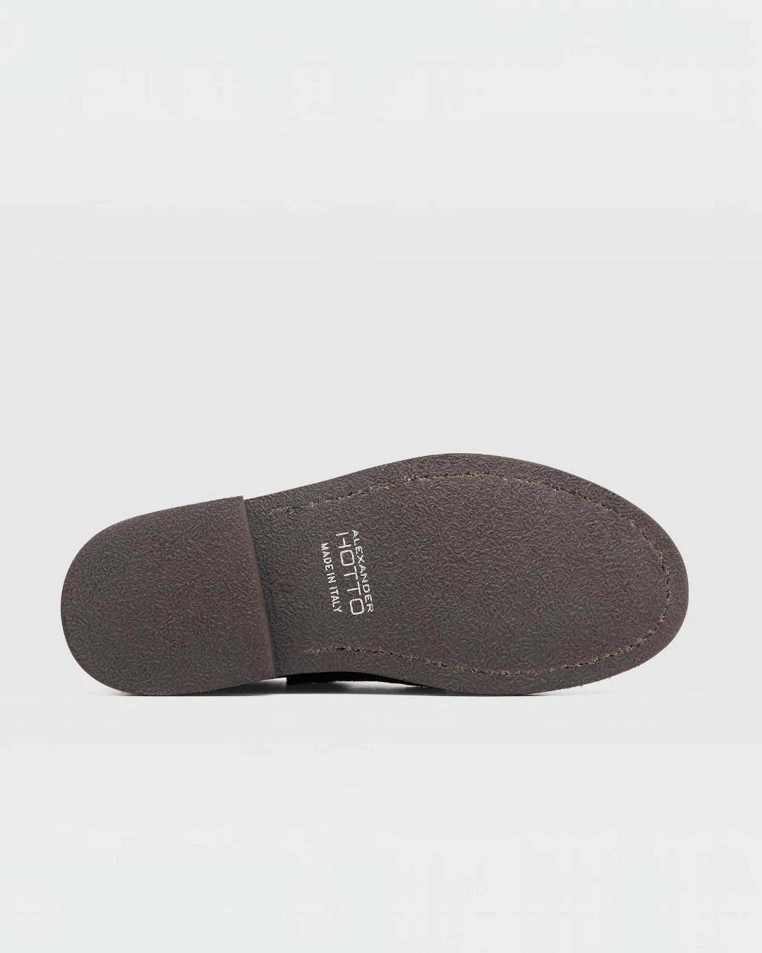 Semelle extérieure en caoutchouc marron de la chaussure Merci Paris Alexander Hotto avec logo imprimé