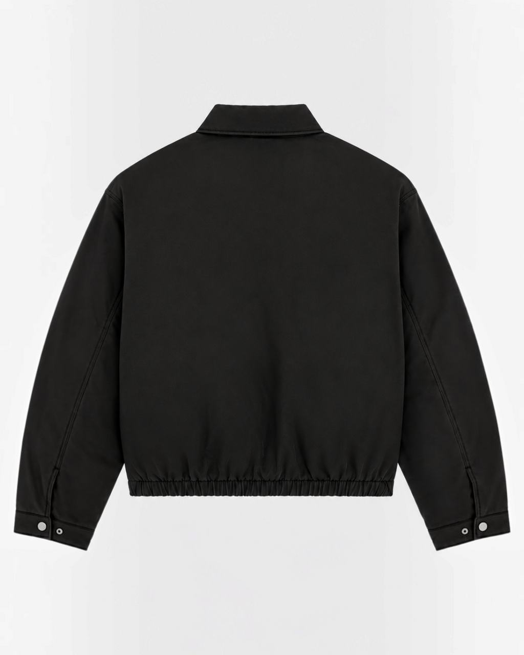 Vue arrière de la veste Eisenhower noire en coton de Merci Paris, style workwear avec ourlet élastiqué.