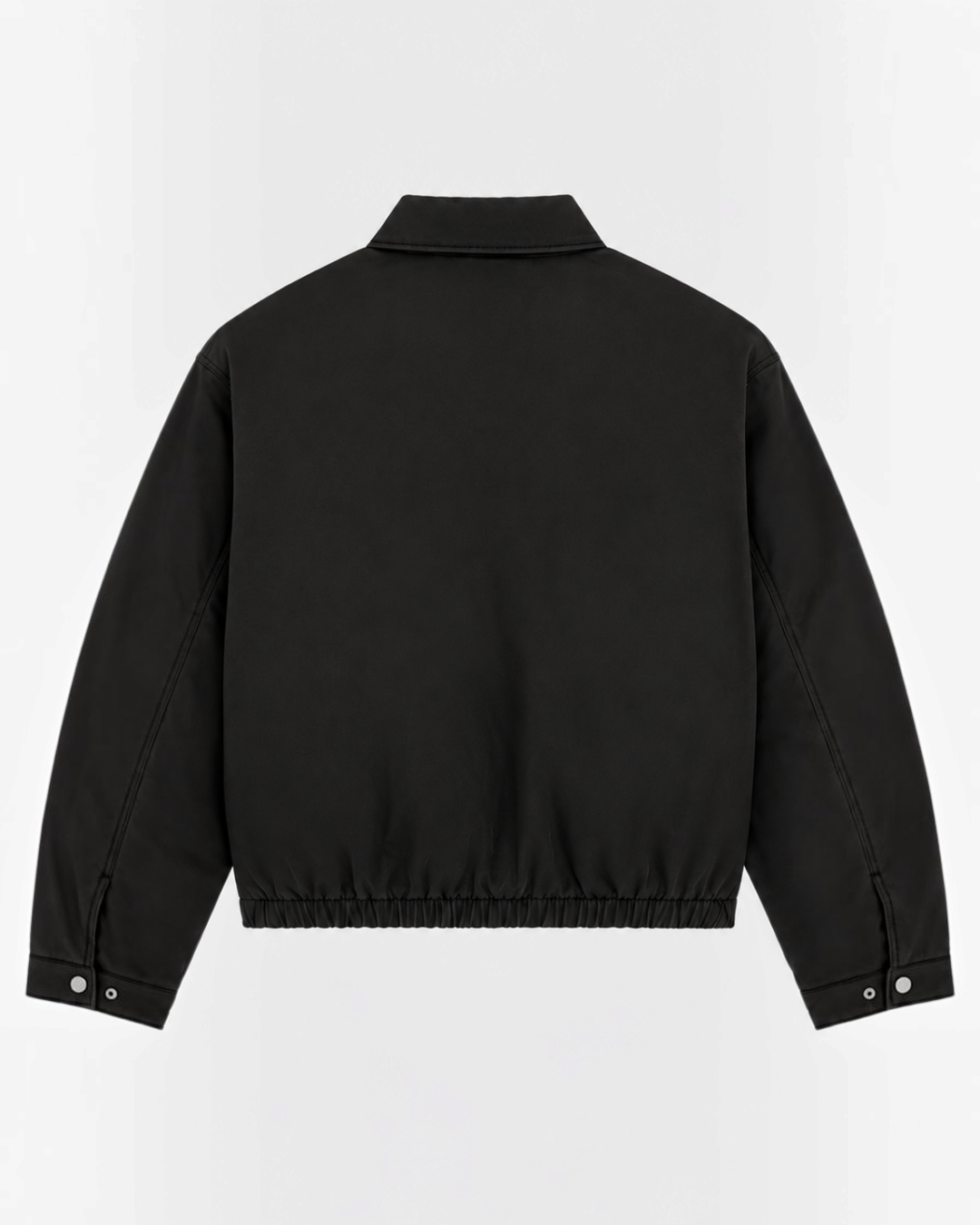 Vue arrière de la veste Eisenhower noire en coton de Merci Paris, style workwear avec ourlet élastiqué.