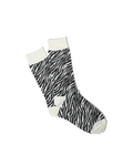 Chaussettes Merci Paris Anonymous ISM Animal Crew en coton écru et noir avec un motif zébré, fabriquées au Japon.