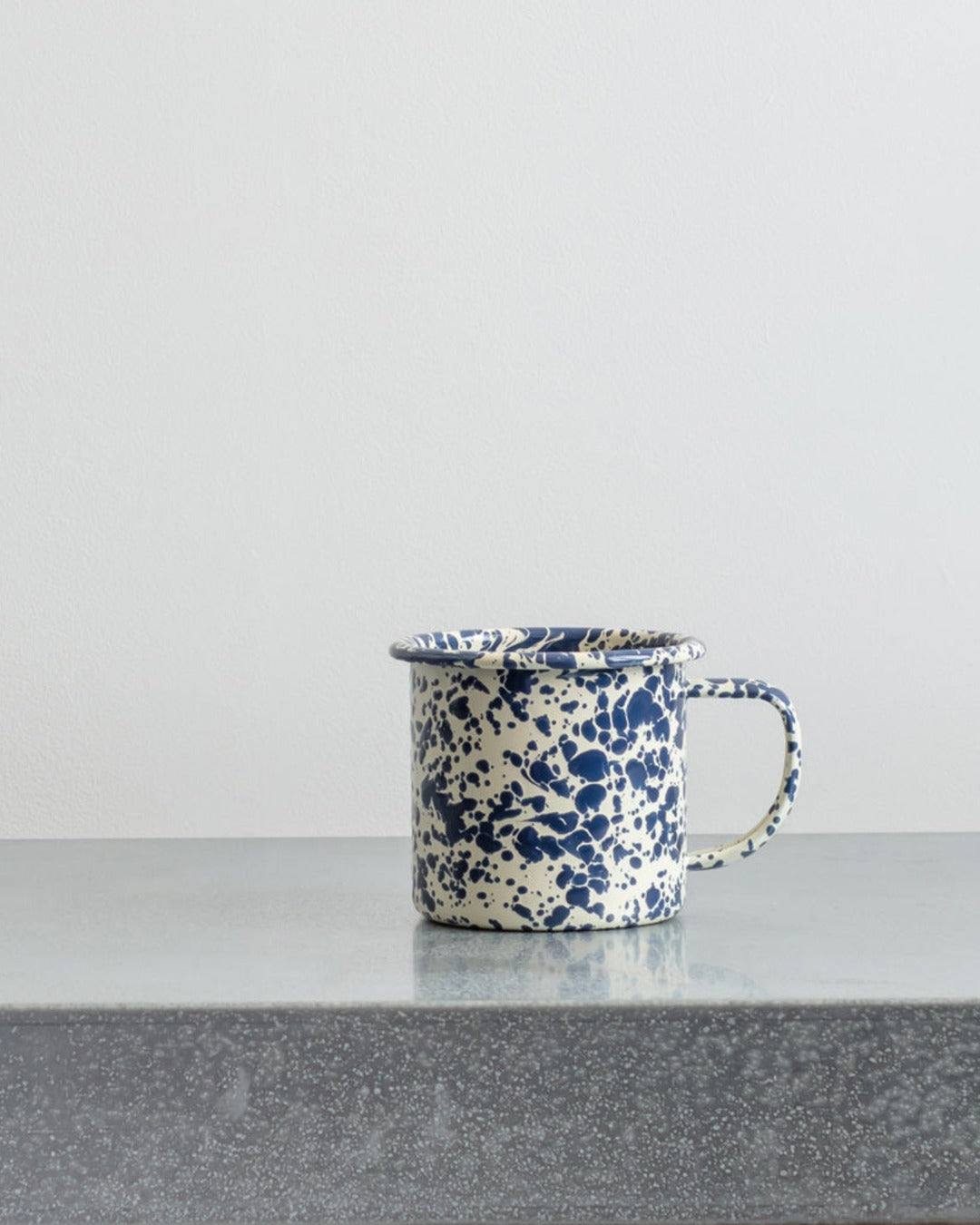 Crow Canyon Home - Enamel mug with blue splashes
