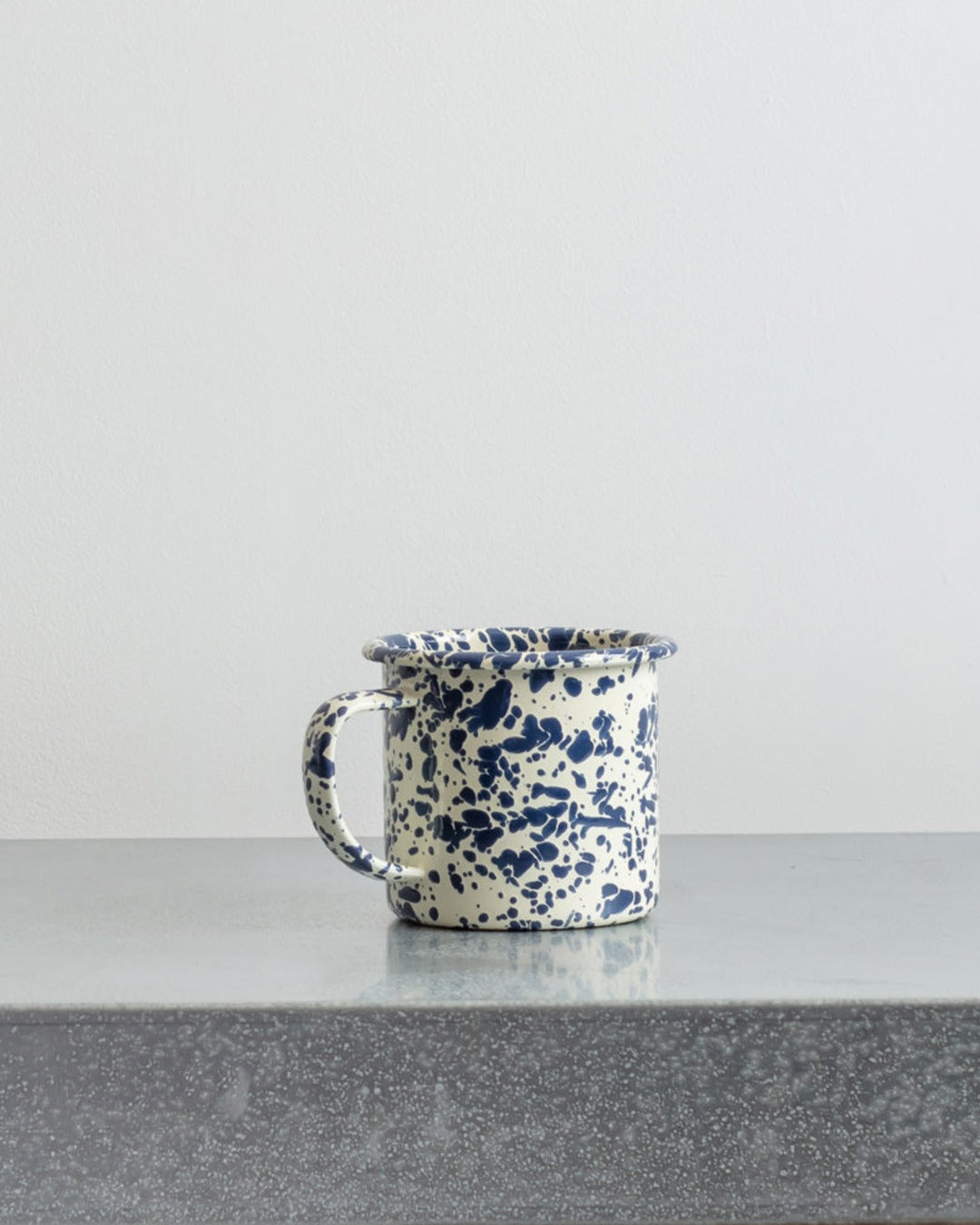 Crow Canyon Home - Enamel mug with blue splashes