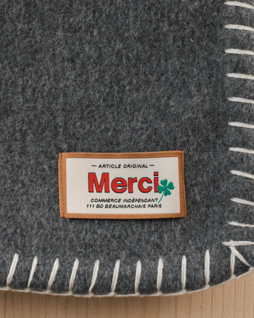 Merci - Couverture - Gris