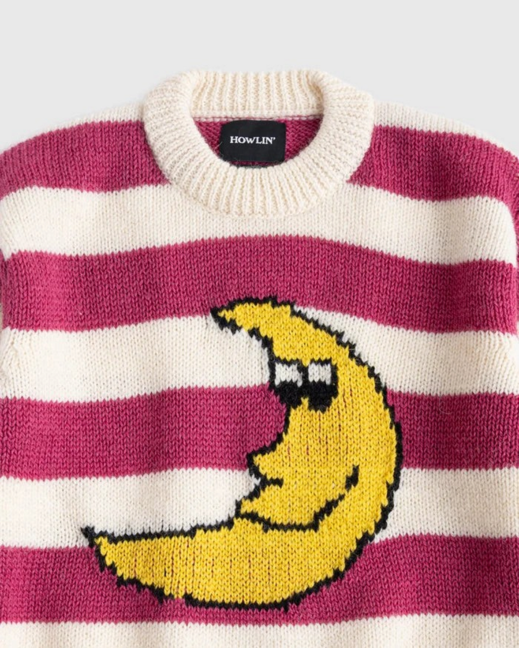 Pull Merci Paris Howlin' Uncle Moon en laine vierge rayé rose et blanc avec motif lune jaune