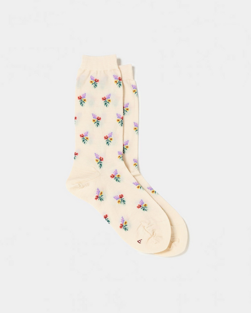 Chaussettes Merci Paris Babaco en maille écru avec motif de petits bouquets de fleurs colorés, fabriquées au Japon