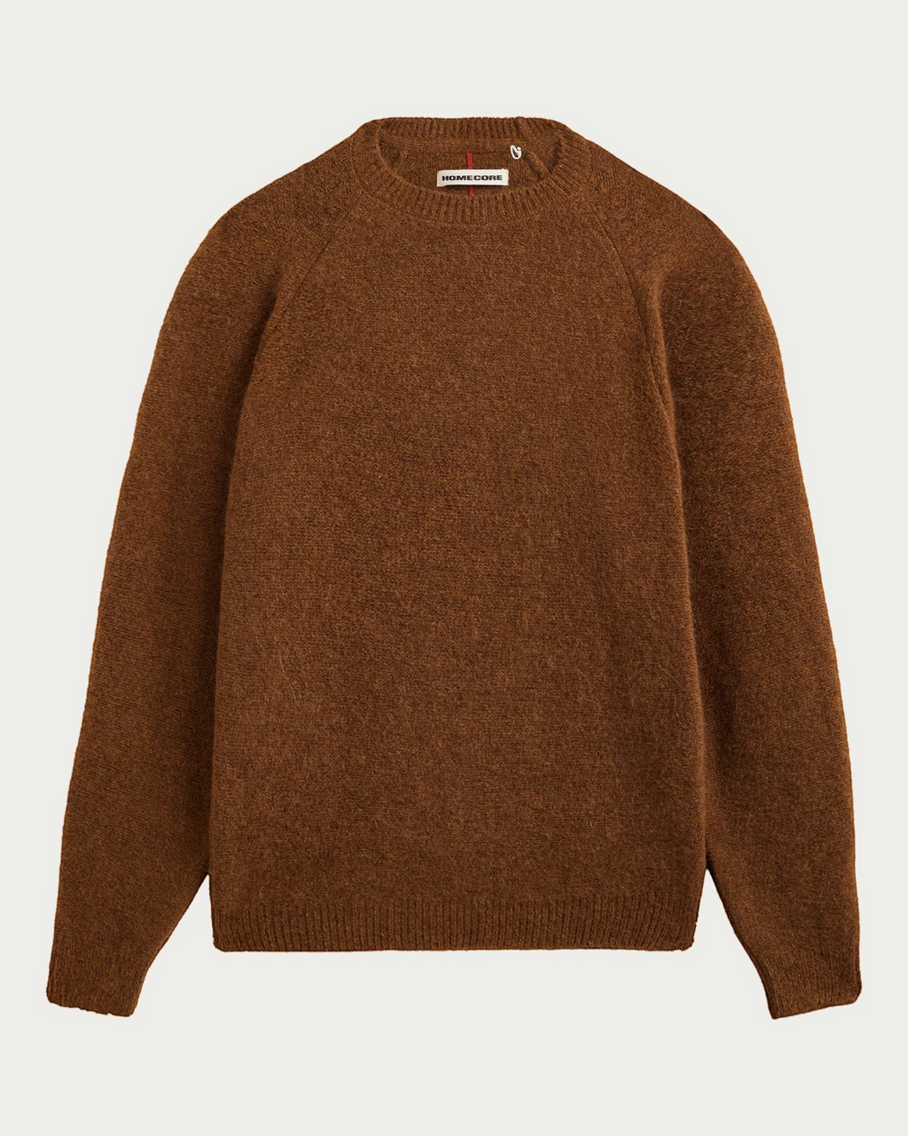 Pull Homecore en maille d'alpaga marron coffee à col rond, disponible chez Merci Paris