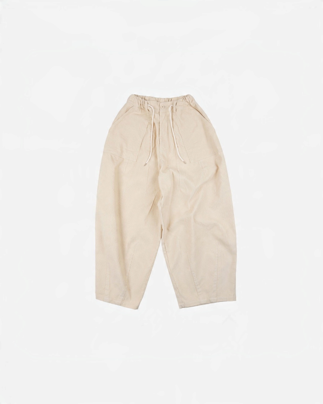 Pantalon ballon Merci Paris Frizmworks en velours côtelé ivoire avec taille élastiquée et coupe ample arrondie