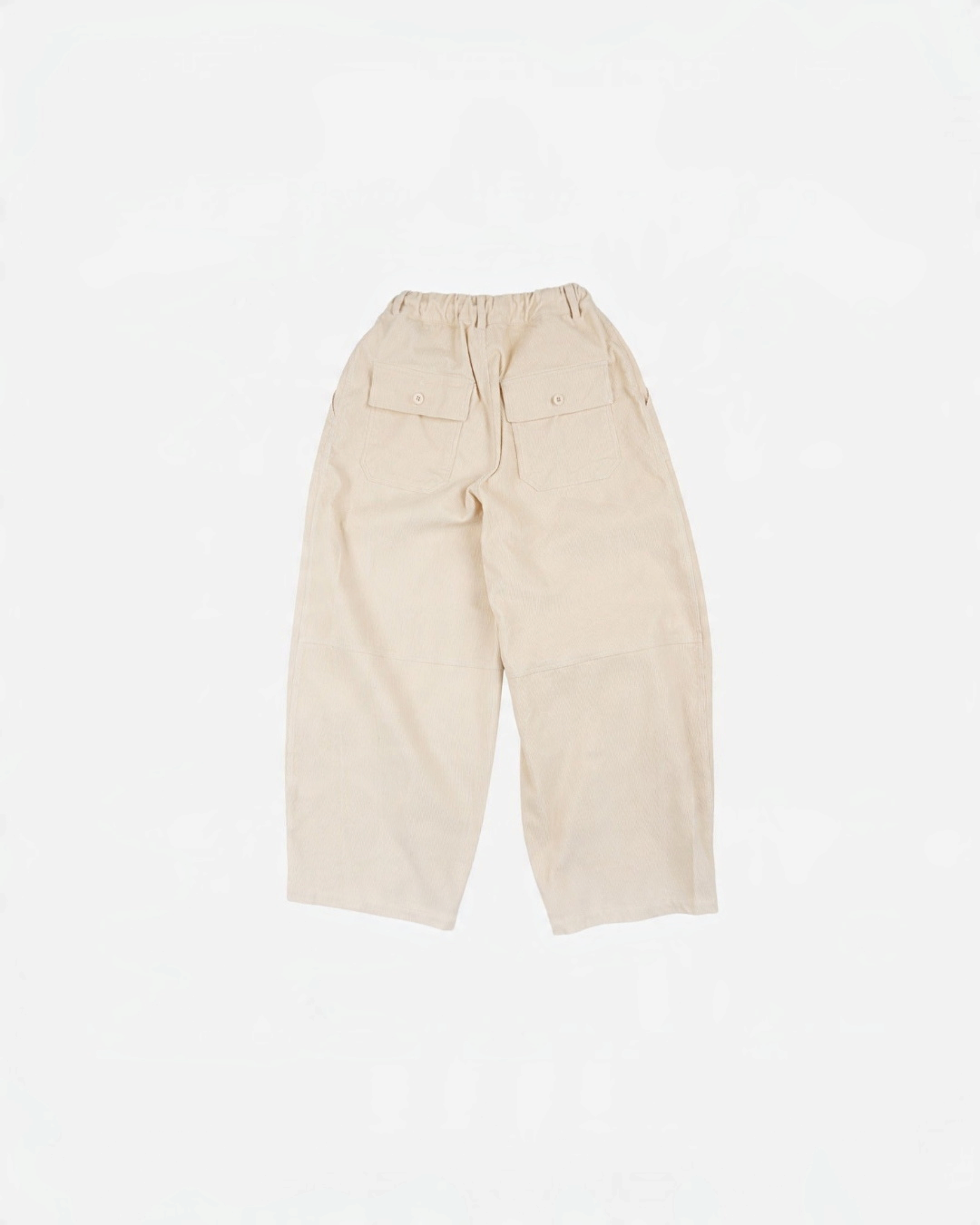 Pantalon ballon Merci Paris Frizmworks en velours côtelé ivoire avec poches arrière boutonnées et coupe ample