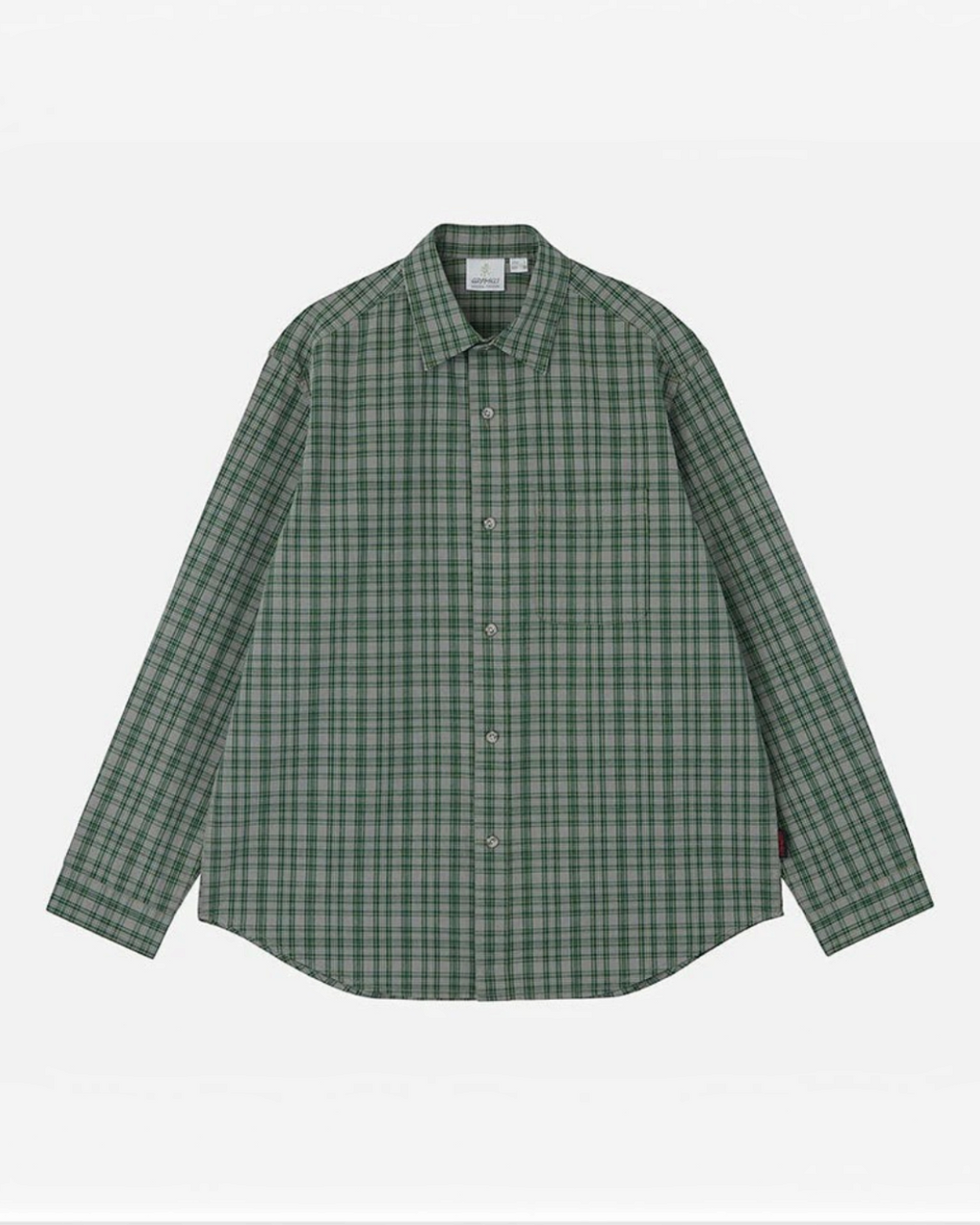 Chemise Gramicci par Merci Paris en coton épais à carreaux verts et gris avec poche poitrine et coupe décontractée
