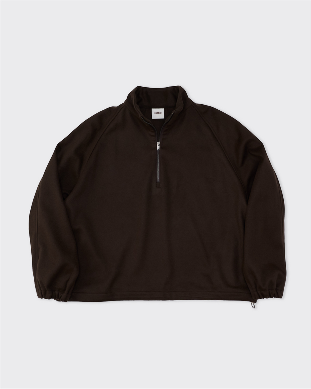Pull demi-zip Merci Paris Colbo en laine marron avec col montant, manches raglan et fermeture zippée
