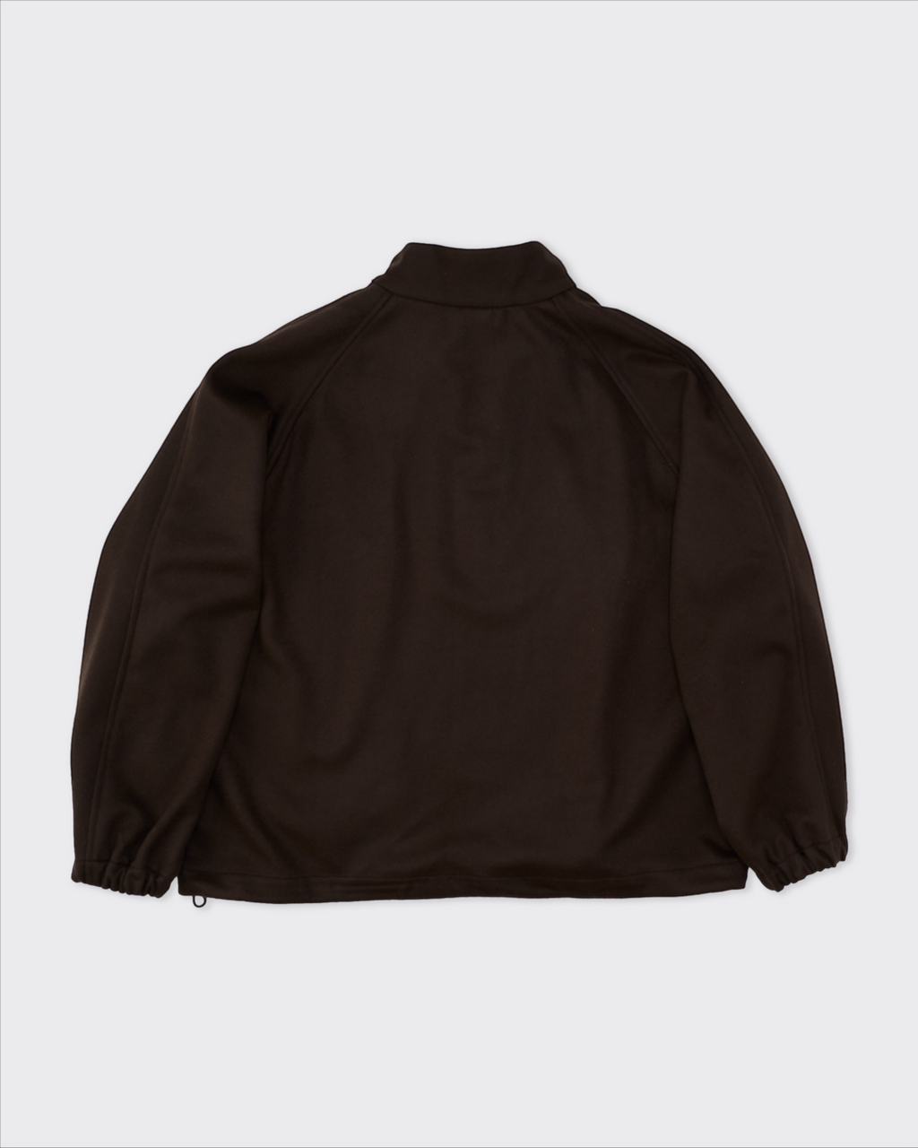 Vue arrière du pull demi-zip Merci Paris Colbo en laine marron avec col montant et poignets élastiqués