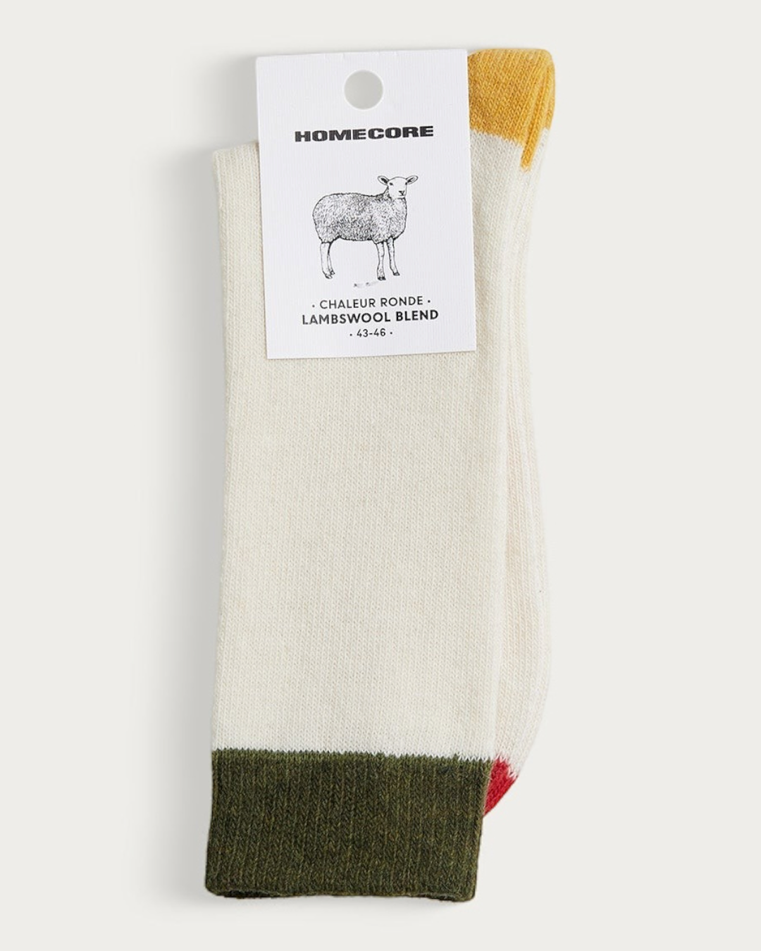 Chaussettes Homecore en laine d'agneau crème avec talon et pointe contrastés, vendues par Merci Paris