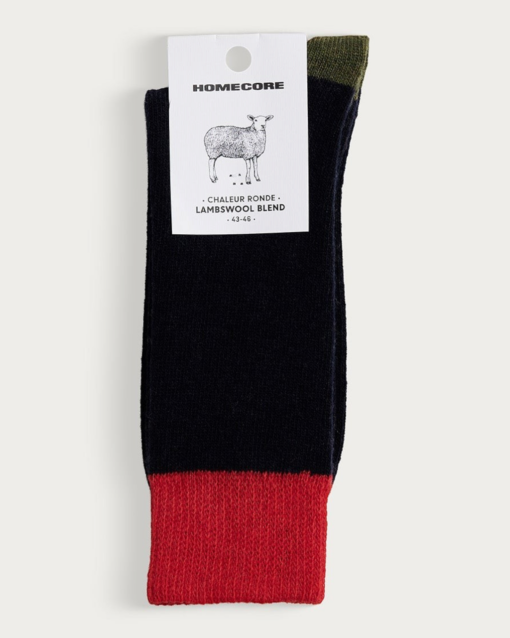 Chaussettes Merci Paris Homecore en laine d'agneau bleu marine avec talon et bordure contrastés rouge et vert