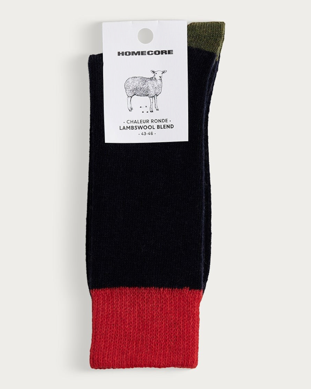 Chaussettes Merci Paris Homecore en laine d'agneau bleu marine avec talon et bordure contrastés rouge et vert