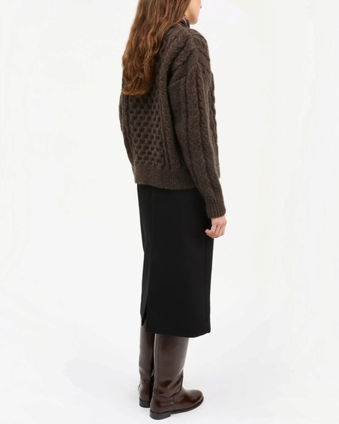 Lennox cardigan Merci Paris in dark brown wool with cable knit worn by a woman from behind