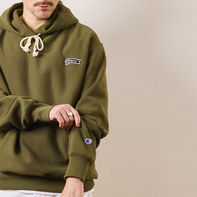 Merci x Champion - Sweat à Capuche - Olive