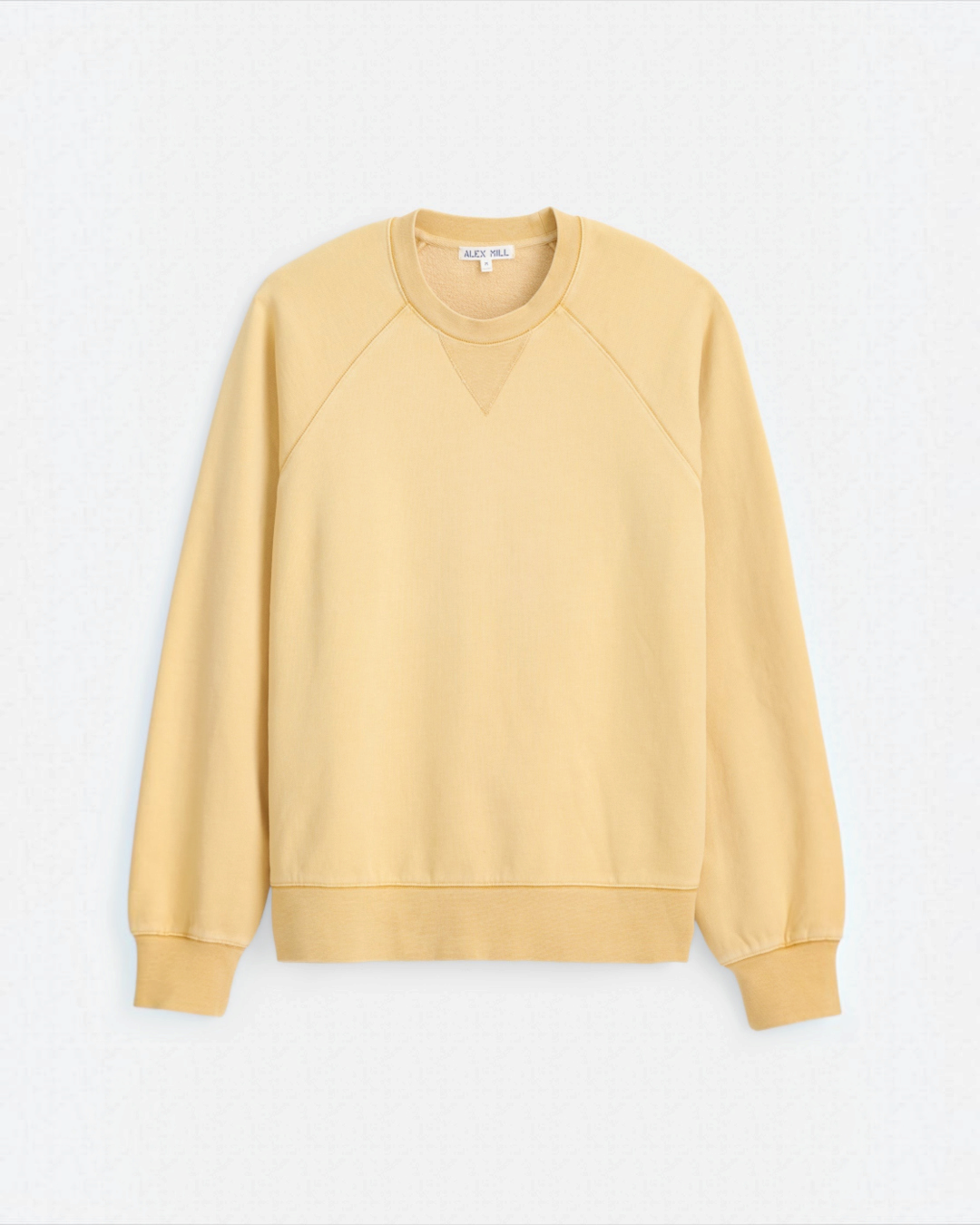 Sweat Merci Paris Alex Mill en molleton de coton jaune beurre avec manches raglan et détail triangulaire au col