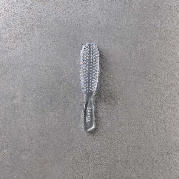 Brosse à cheveux cristal bleue - Cartel