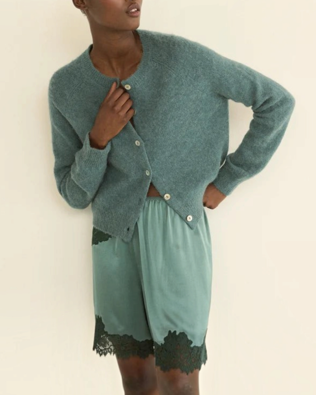 Petra cardigan Merci Paris bleu in soft alpaca knit and merino wool with shell buttons