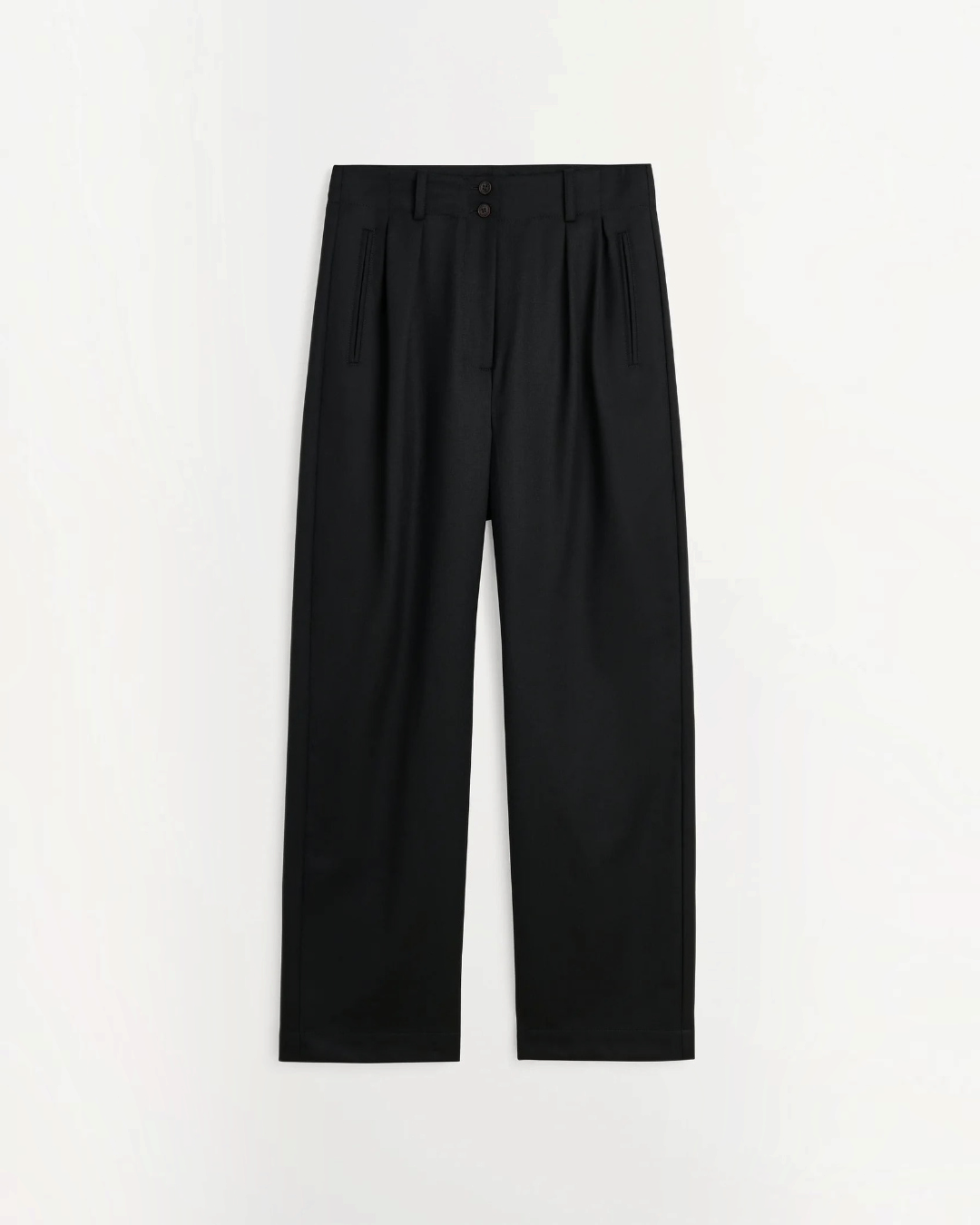 Pantalon large noir Skall Studio en laine avec taille semi-haute et plis, disponible chez Merci Paris