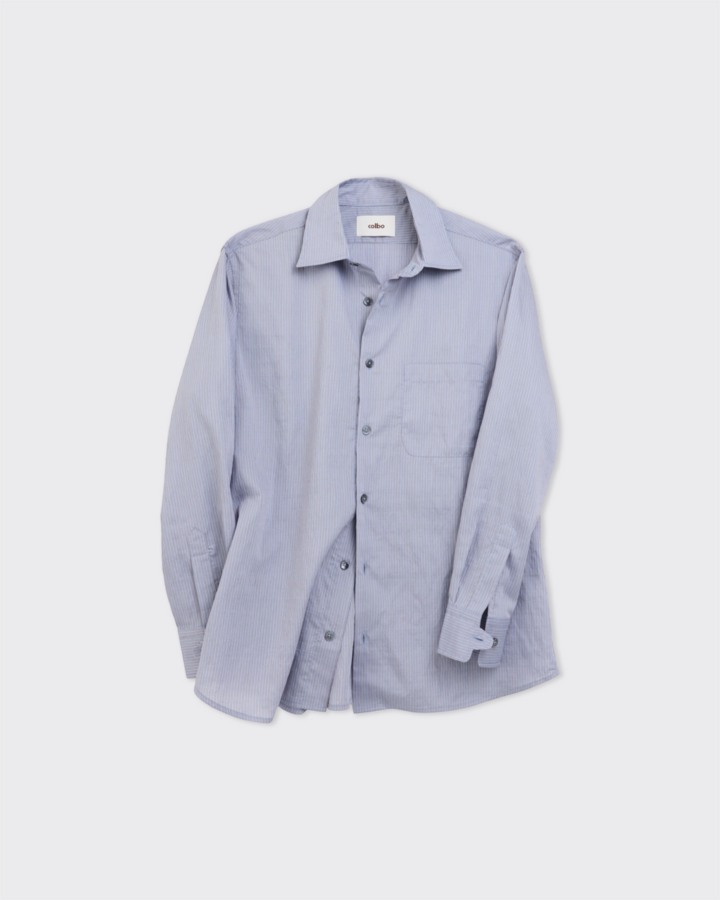 Chemise Merci Paris Colbo Pen à fines rayures bleues, coupe ample en mélange de lyocell et polyamide.