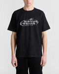 T-shirt noir en coton Merci Paris avec logo Bisous Techno Records blanc sur la poitrine porté par un mannequin