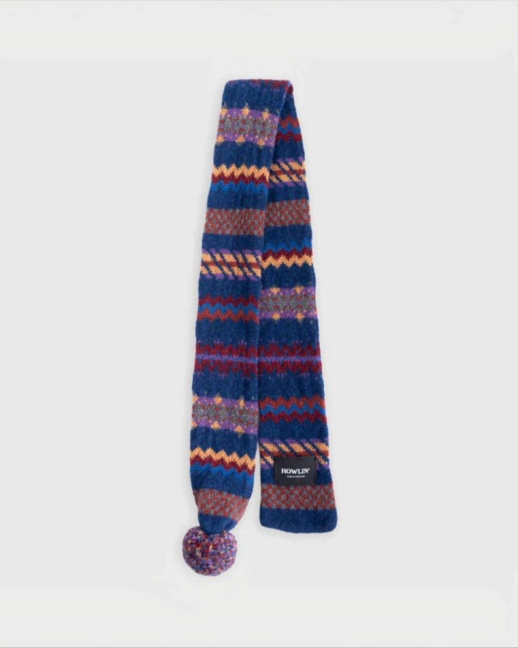 Écharpe Merci Paris Howlin' Small Woolen Wonder en laine d'agneau bleu marine avec motif Fair Isle et pompon