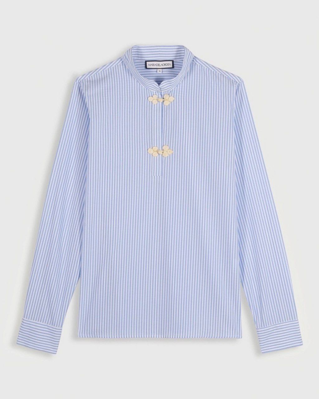 Chemise Merci Paris Maria De La Orden Blanca à rayures bleues et boutons décoratifs style brandebourg