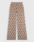 Pantalon Douglas Merci Paris par Maria De La Orden, coupe large beige à motifs floraux marron et plis structurés.