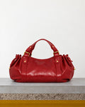 Gerard Darel - Sac À Main En Cuir Effet Froissé 24H - Rouge – Vue sur banc