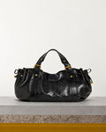 Gerard Darel - Sac À Main En Cuir Effet Froissé 24H - Noir – Vue sur banc