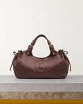Gerard Darel - Sac À Main En Cuir Effet Froissé Chiara - Marron – Vue sur banc