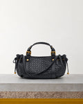 Gerard Darel - Mini Sac À Main En Cuir Tressé 12H - Noir – Vue sur banc